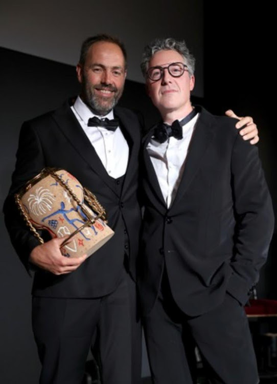 Eben Sadie receiving the Golden Vines Award from Matteo Atti. Picture: MARC PIASECKI/GETTY IMAGES