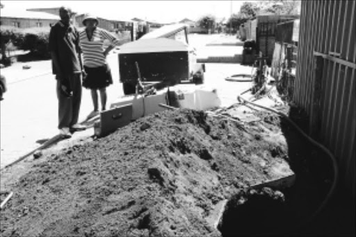 OVERLOAD: Dobsonville residents are suffering because of continual outages. Pic: MOHAU MOFOKENG. 16/12/2009. © Sowetan.
