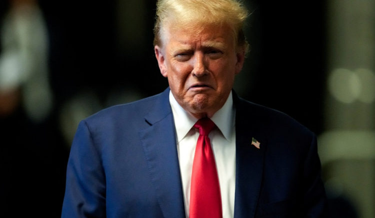 Former US President Donald Trump speaks to members of the media before departing Manhattan criminal court on May 6 in New York, US. Picture: REUTERS/JULIA NIKHINSON