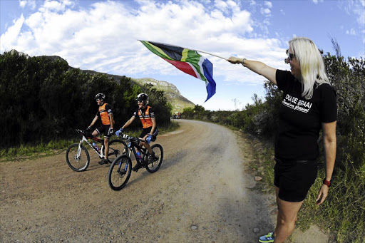 Riders of the inaugural Tour de Braai, a gravel ride from George to Swellendam, make their way up Montagu Pass.