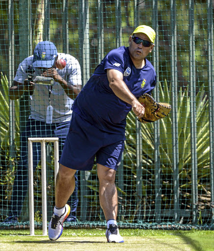 Coach Russell Domingo bowling to Vernon Philander of South Africa during the South Africa training and press conference at Bidvest Wanderers Stadium on January 11, 2017 in Johannesburg, South Africa.