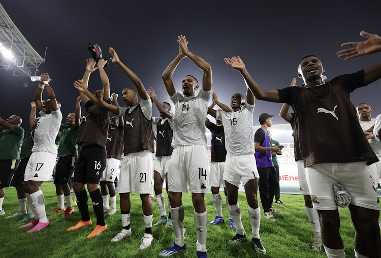 Bafana Bafana centre-back Mothobi Mvala leads the players in celebration after their 2-0 win against Morocco in San Pedro, Ivory Coast, on Tuesday night. Picture: BACKPAGEPIX