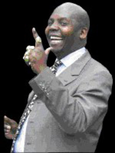 HAPPY: Downs' Alex Shakoane SUPPORTIVE: Alex Shakoane. MENWANA PHEZULU: Alex Shakoane. Pic. Len Kumalo. 17/7/00. © Sowetan.
