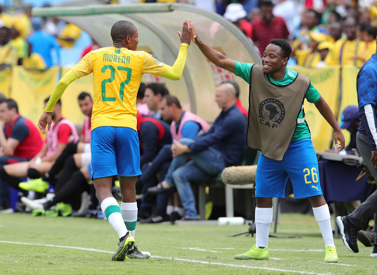 Mamelodi Sundowns goalscorer Thapelo Morena celebrating his goal against USM Alger with teammate Keletso Makgalwa at Loftus Stadium on Saturday.