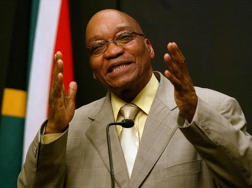 ** FILE ** Dismissed Deputy President Jacob Zuma responds to questions, during a press conference in Cape Town, South Africa, in this June, 14, 2005 file photo. The National Prosecuting Authority said in Pretoria South Africa, Monday, June 20, 2005 that Zuma will be prosecuted on two counts of corruption. (AP Photo/Obed Zilwa)