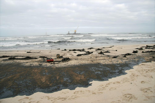 Oil washing up on shore in Cape Town