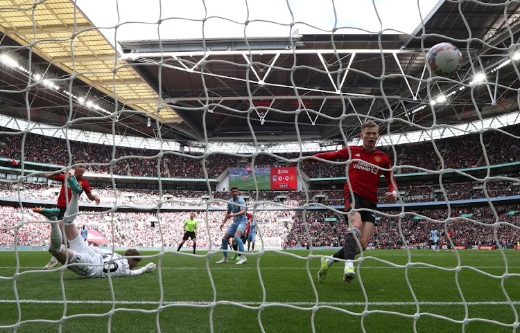 Manchester United's Scott McTominay scores their first goal against Coventry City at Wembley Stadium in London, Britain, April 21,2024 Picture: Reuters/Toby Melville