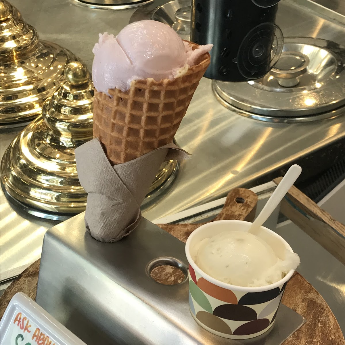 strawberry coconut in a waffle cone // Lemon Basil in a cup. Both dairy free.