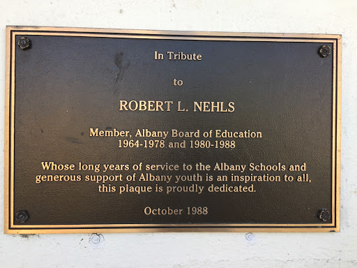 In Tribute  to  ROBERT L. NEHLS  Member, Albany Board of Education  1964-1978 and 1980-1988  Whose long years of service to the Albany Schools and  generous support of Albany youth is an...