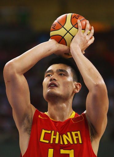 Yao Ming of China shoots during the Men's Preliminary Round Group B basketball game against Angola at the Olympic Basketball Gymnasium during day 6 of the Beijing 2008 Olympic Games on August 14, 2008 in Beijing, China