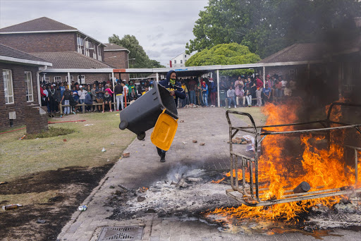 November 11 2015 - UWC students protested & fought back against SAPS & a private security company that tried in vain all afternoon to disperse to group of around two to three hundred who wanted five of their colleagues arrested earlier in the morning released.