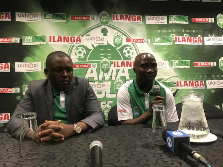 AmaZulu FC striker Siyabonga Nomvethe (R) announces his retirement during a press conference in Durban alongside club chairman Lunga Sokhela on Friday September 14 2018.
