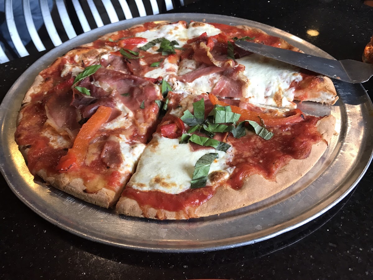 Pomodoro pizza on the Gluten Free crust. Absolutely incredible. The Prosciutto was salty and just slightly crispy, just as it should be. The sauce was the right amount of sweet and the mozzarella was perfect.