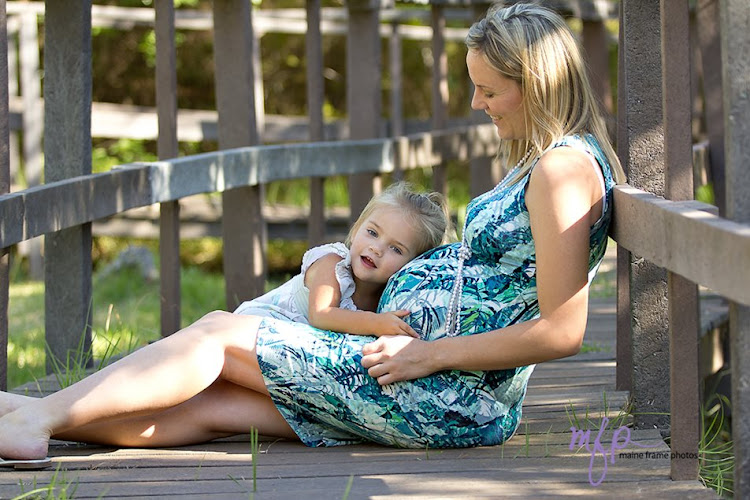 “This is my favourite photo because my daughter was so involved in the picture and it’s like she’s listening to the baby,” says Kirsten Ramsay.