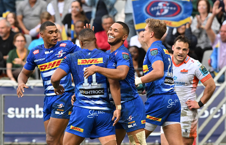 Stormers players celebrate the United Rugby Championship (URC) match against Ulster at the Cape Town Stadium.