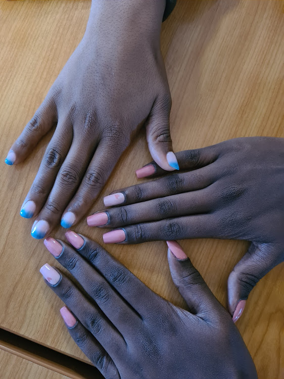 Photo of nails coated with gel nail polish