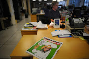 A picture taken on 1 November 1 2011 in Paris shows the cover of an issue of Satirical French magazine Charlie Hebdo  featuring prophet Mohammed. File photo.