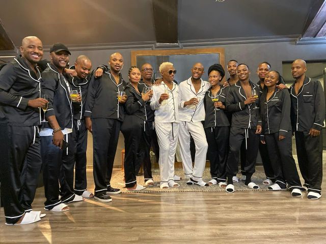 Somizi and Mohale flanked by well wishers
