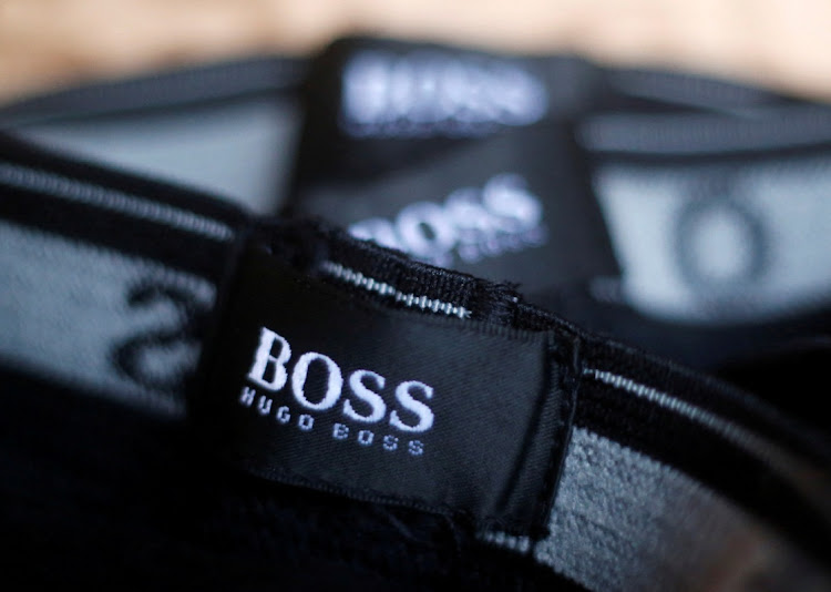 The logo of German fashion house Hugo Boss is seen on a clothing label at their outlet store in Mezingen near Stuttgart, Germany. File photo: MICHAEL DALDER/REUTERS