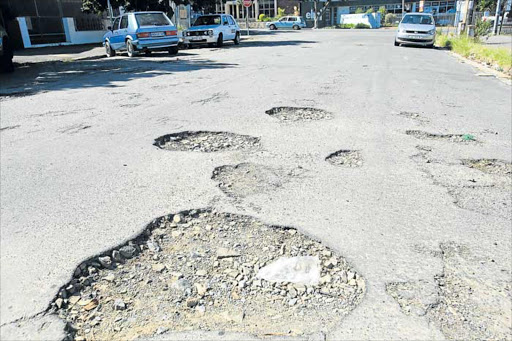 EYESORE: Although 755 streets have been fixed in a year, it seems like a drop in the ocean to BCM drivers Picture: SINO MAJANGAZA