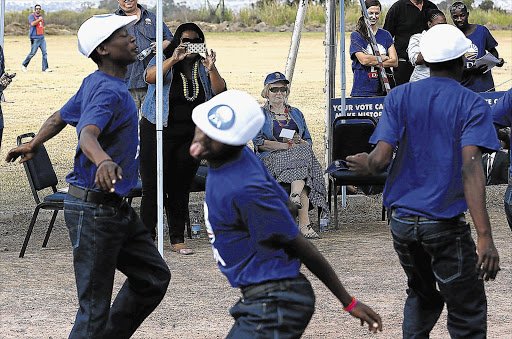 CHARM OFFENSIVE: DA leader Helen Zille in Seeisoville township, near Kroonstad, yesterday, where she said her party was for 'blue people'