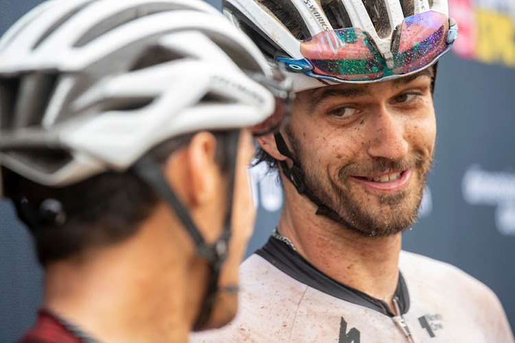 Christopher Blevins and Matt Beers of Toyota-NinetyOne-Specialized after winning stage four of the Absa Cape Epic Mountain Bike stage race from Elandskloof in Greyton to Elandskloof in Greyton on March 24, 2022.