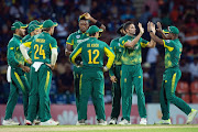 Keshav Maharaj (2nd R) of South Africa celebrates the wicket of Kusal Mendis of Sri Lanka (not in picture) with team mates during the 4th ODI between Sri Lanka and South Africa at Pallekele International Cricket Stadium on August 08, 2018 in Pallekele, Sri Lanka. 