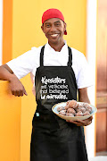 Chef Naseer Abdullah sports an apron that reads 'koesisters are vetkoeke that believed in miracles'.