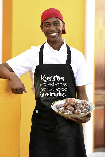 Chef Naseer Abdullah sports an apron that reads 'koesisters are vetkoeke that believed in miracles'.