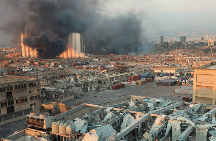 Smoke rises from the site of an explosion in Beirut, Lebanon August 4, 2020.