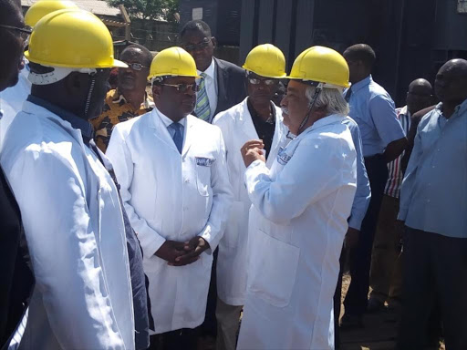 Bungoma Governor Kenneth Lusaka (2nd L) and county officials meet the Rai Family Group, which will revive the mill, at the factory last month /BRIAN OJAMAA
