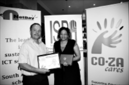 RECOGNITION: Naomi Gumede is presented with a certificate by Theo Kramer of UniForum SA. © Unknown.