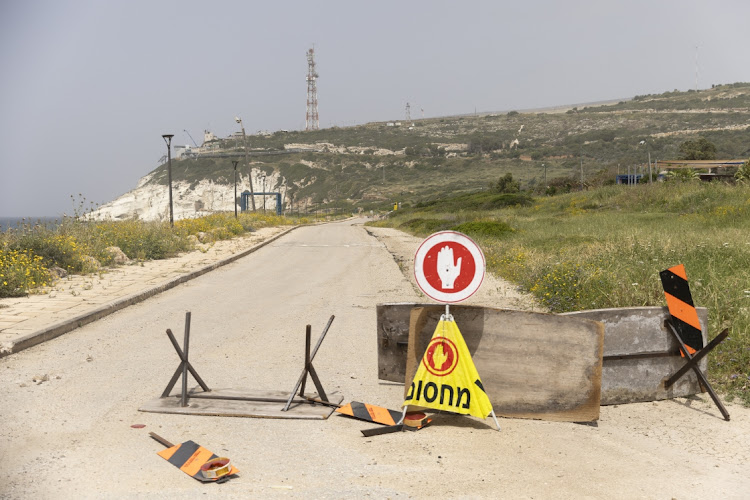 A military barrier is placed on a road near the the border with Lebanon on April 18 2024 in Rosh Hanikra, Israel. Rosh Hanikra and other towns near the Lebanese border remain evacuated due to frequent skirmishes between Hezbollah, the Iran-backed militant group based in Lebanon, and the Israeli military.