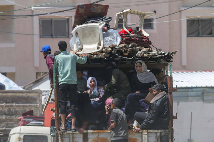 People flee the eastern parts of Rafah after the Israeli military began evacuating Palestinian civilians ahead of a threatened assault, in Rafah, Gaza Strip, May 6 2024. Picture: REUTERS/HATEM KHALED