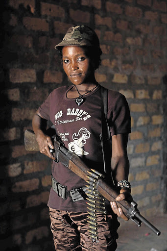 Maria Musa, 22, is one of thousands of young women and men in the Central African Republic capital Bangui who are joining rebel group Seleka, which has promised to pay them R1000 a month each