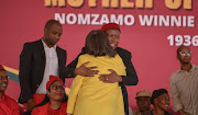 EFF leader Julius Malema embraces Cape Town Mayor Patricia de Lille at the EFF's memorial service for Winnie Madikizela-Mandela. 
