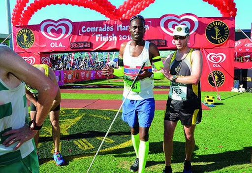 Veteran blind Comrades Marathon runner Richard Monisi .