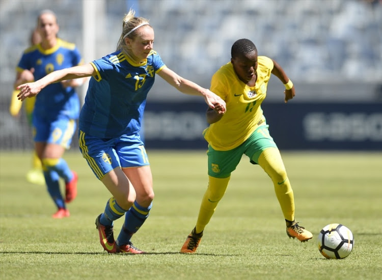 manda Ilestedt of Sweden and Thembi Kgatlana of South Africa during the International Women's Friendly match between South Africa and Sweden at Cape Town Stadium on January 21, 2018 in Cape Town, South Africa.