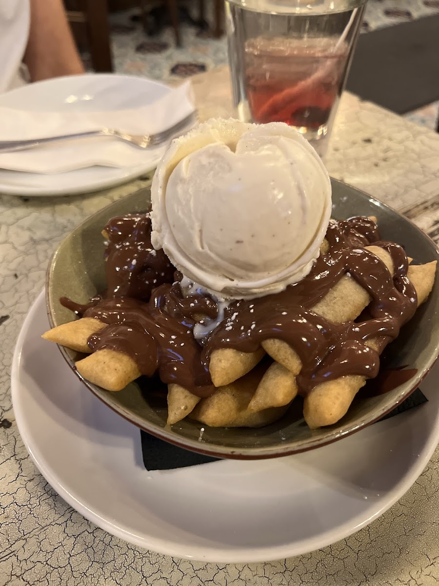 Fried dough with nutella sauce and ice cream