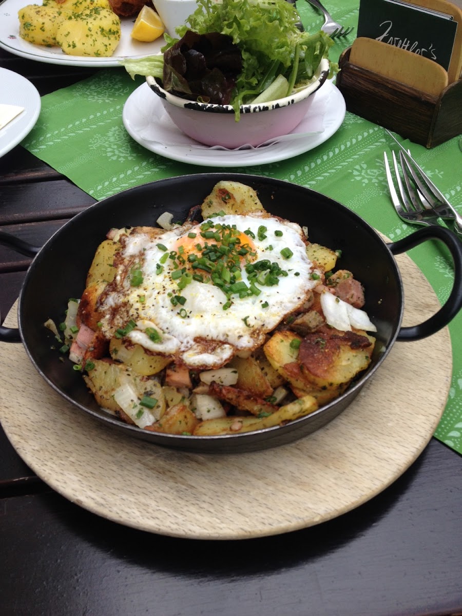 GF SKILLET potatoes  , meat and a fried egg on top. Comes with a side of Austrian slaw.  Really good