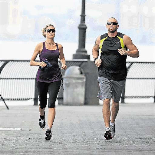 WHAT A CATCH: Heidi Klum and Martin Kirsten, seen here jogging in New York have found love after her marriage to Seal broke up early this year Picture: FILM MAGIC