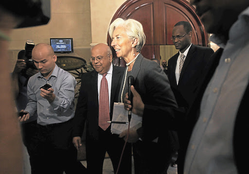 COURTESY VISIT: Finance Minister Pravin Gordhan and IMF managing director Christine Lagarde speak to the media at the Sheraton Hotel in Pretoria after their breakfast meeting on Friday PICTURE: KEVIN SUTHERLAND