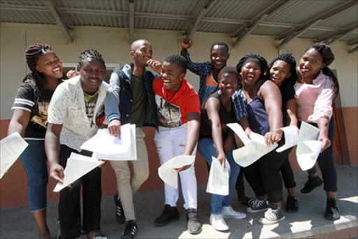JOB WELL DONE: A group of St Patricks’ High School matriculants celebrate after passing matric at the school, situated at Gxolu village in Libode Picture: LULAMILE FENI