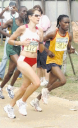 SURPASSING EXPECTATIONS: Rene Kalmer, women's winner at the 2009 Nedbank Soweto Marathon. Pic. Veli Nhlapo. 01/11/2009. © Sowetan.