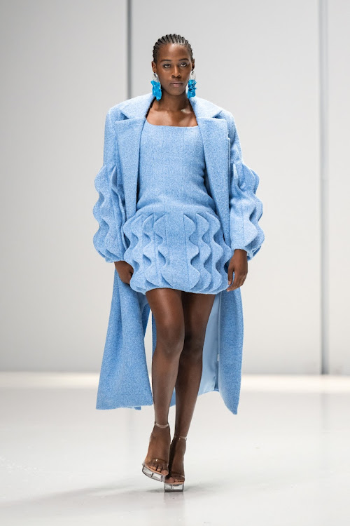 Model walking The Bam Collective SA Fashion Week Spring Summer 2024 runway in cerulean blue ensemble