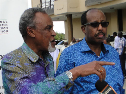 Garissa Senator Yusuf Haji addresses the press at a Garissa hotel on Saturday after meeting leaders and elders. He is with Northeastern regional coordinator Mohamud Saleh / STEPHEN ASTARIKO