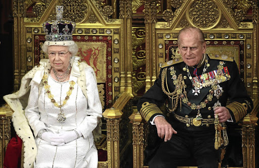 Britain's Queen Elizabeth with Prince Philip in the House of Lords during the state opening of parliament in London.