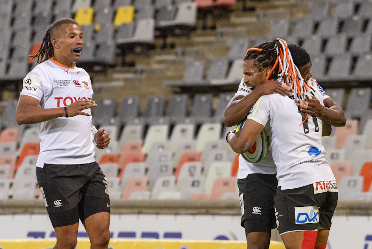 Rosko Specman of the Toyota Cheetahs celebrates with Malcolm Jaer and Clayton Blommetjies after scoring a try during the Super Rugby Unlocked match against the Vodacom Bulls in Bloemfontein on October 16, 2020.