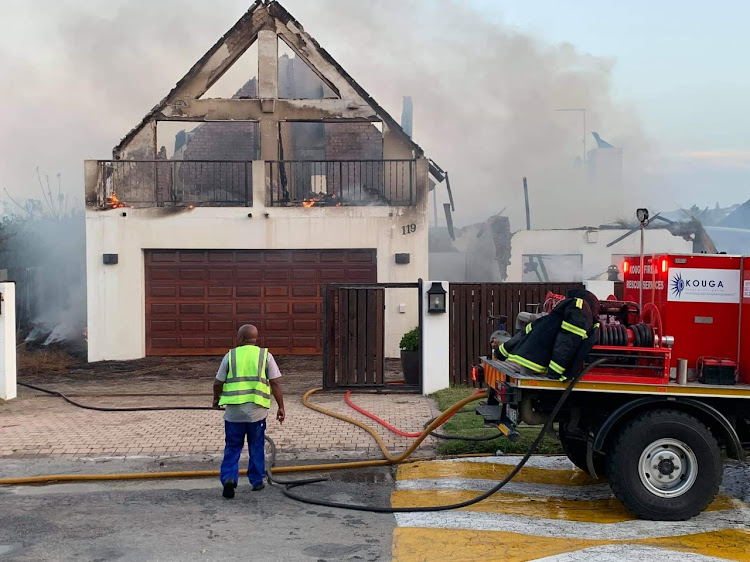 Several homes were destroyed in a blaze in St Francis Bay on Thursday.