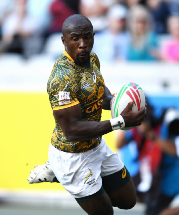 Siviwe Soyizwapi of the South Africa scores during day 1 of the HSBC Cape Town Sevens Pool A, match 15 between South Africa vs Zimbabwe at Cape Town Stadium on December 08, 2018 in Cape Town, South Africa.